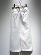 Tucked tight skirt with belt