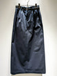 Tucked tight skirt with belt