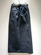 Tucked tight skirt with belt
