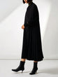 Asymmetrical pleated jumper skirt