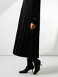 Asymmetrical pleated jumper skirt