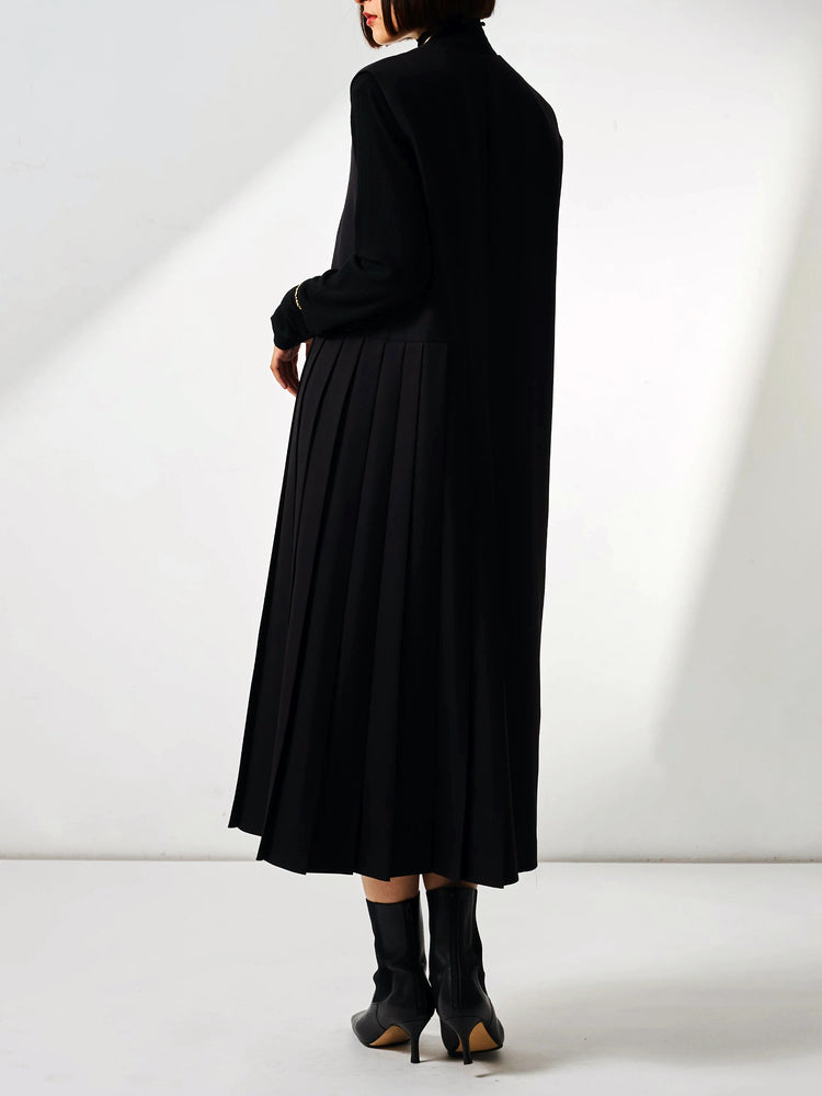 Asymmetrical pleated jumper skirt