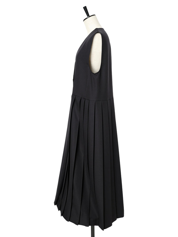 Asymmetrical pleated jumper skirt