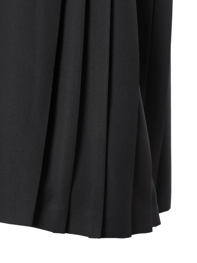 Asymmetrical pleated jumper skirt