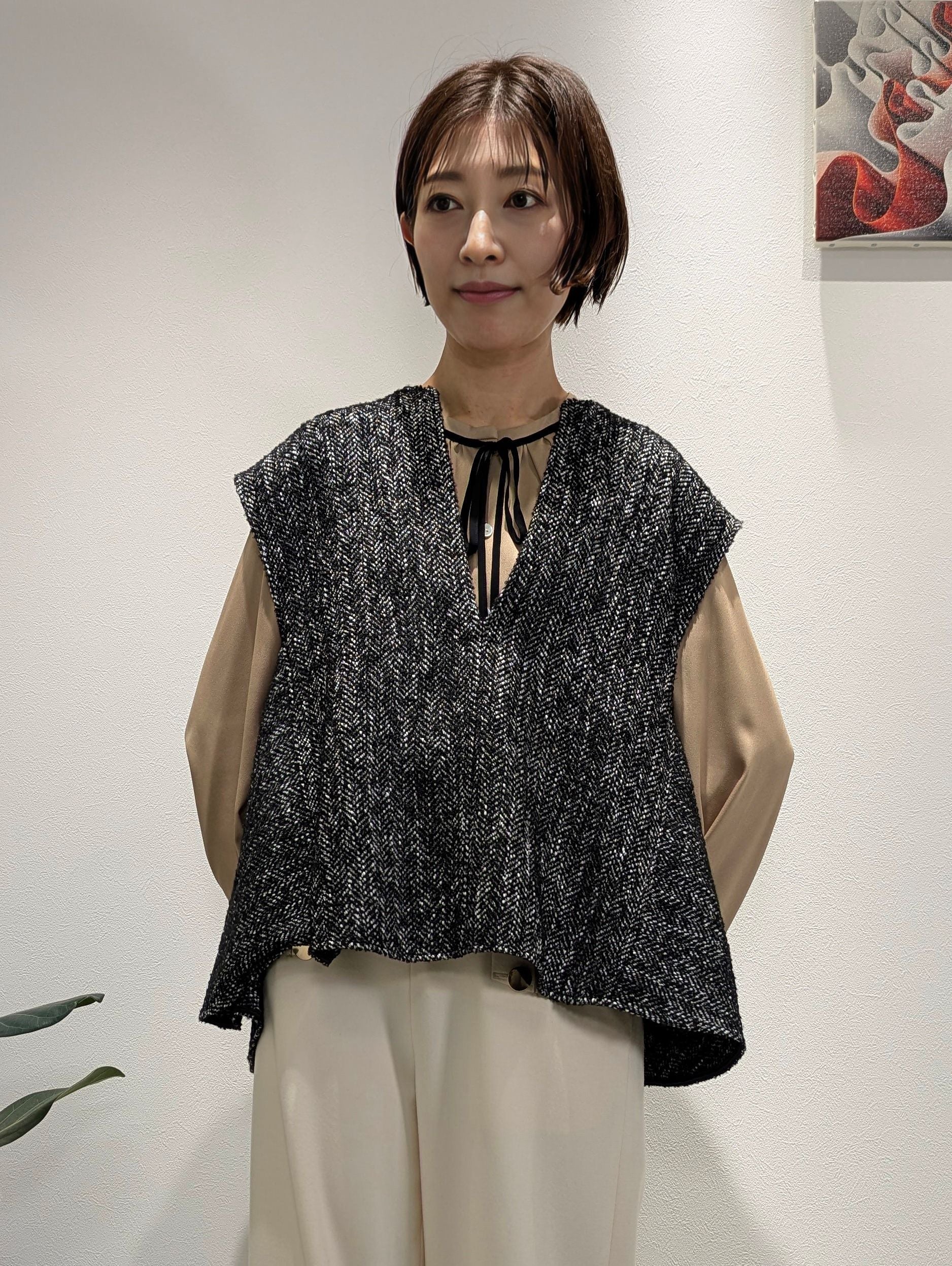 Tweed-style peplum vest