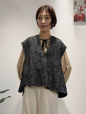 Tweed-style peplum vest