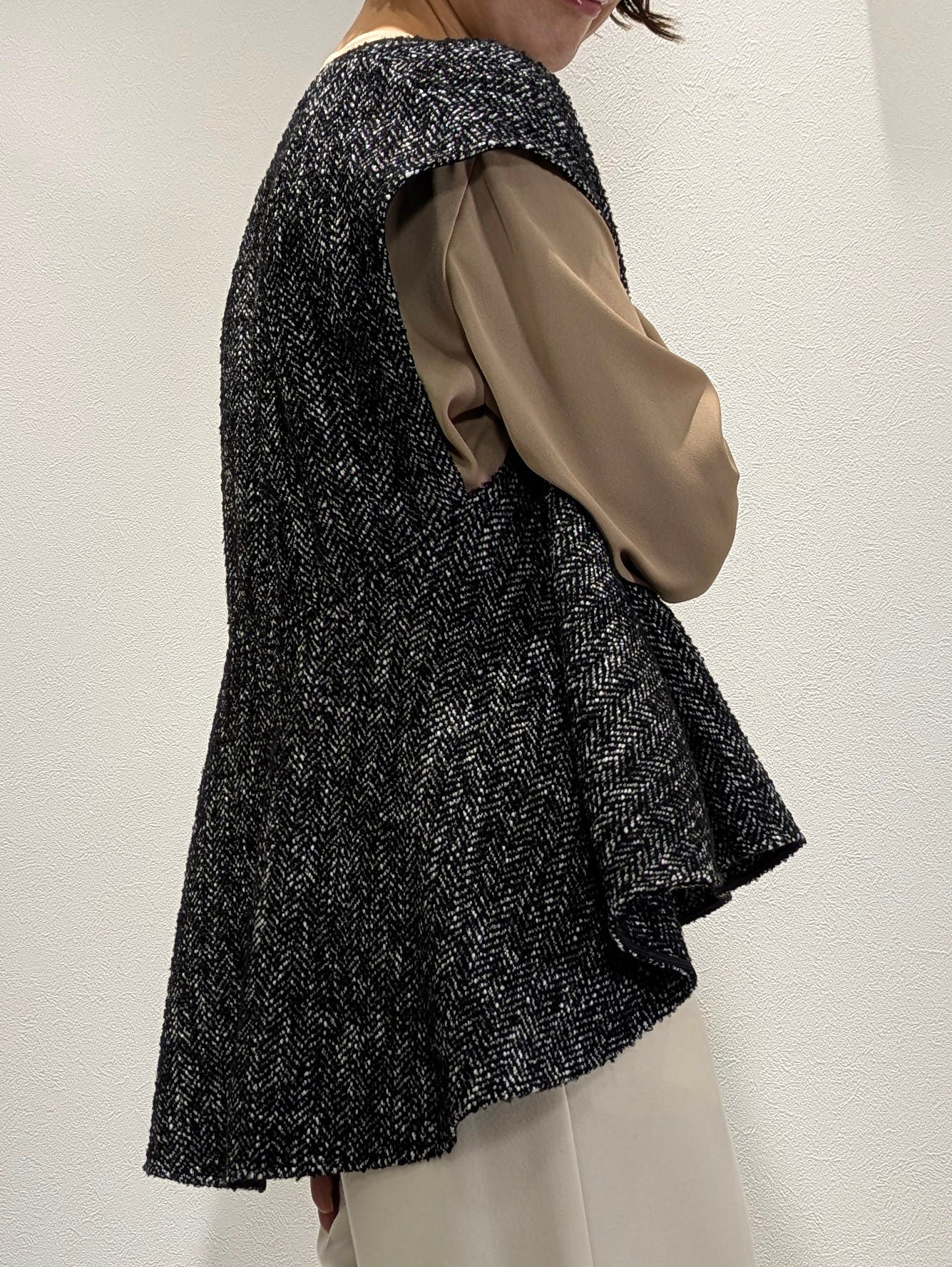 Tweed-style peplum vest